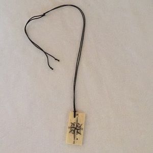 Artisan, reversible Compass Rose/ Domino necklace.